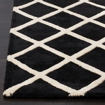 Christy Geometric Tufted Area Rug - Safavieh
