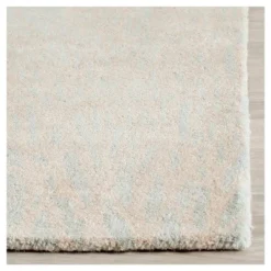 Flynt Botanical Area Rug - Safavieh